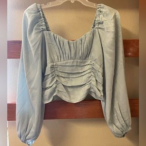 Blue long sleeve shirt. Size S.